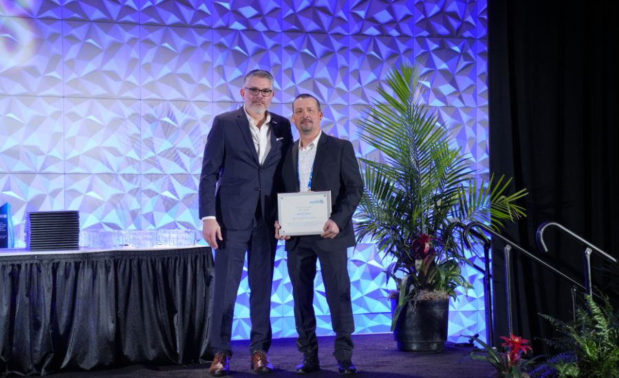 Ariel Lemus accepts NRCA award