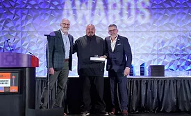 Armando Landeros Solis accepts NRCA award