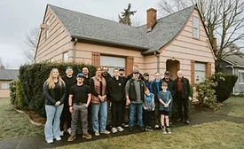 group in front of shelter
