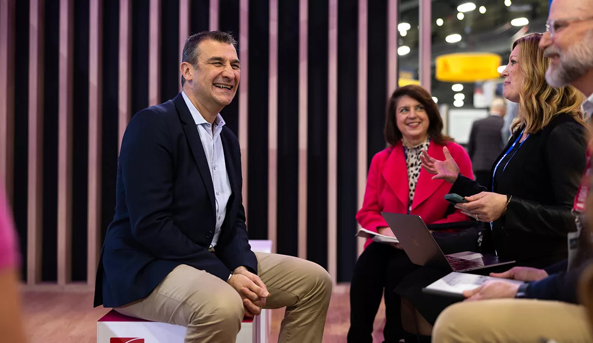 Owens Corning Roofing President Nico Del Monaco interviewed at the Owens Corning booth at IRE 2026 in Las Vegas. 