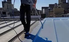 Contractor applying FiberSeal base