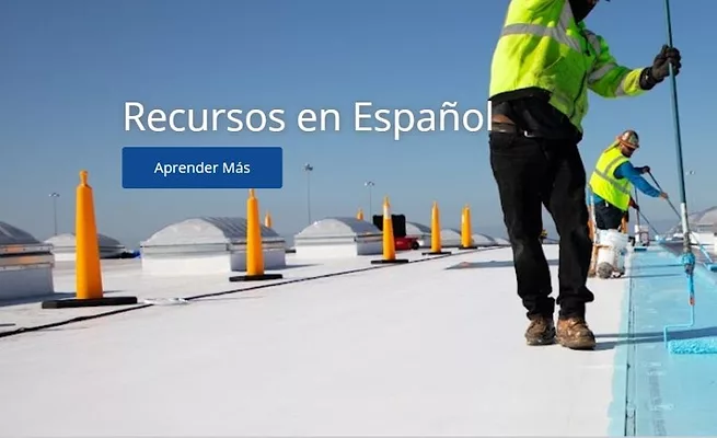 contractor applying coatings on commercial roof