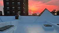 TPO.jpg A completed high-performance enclosure (Gerhardt Apartments, St. Louis). sun sets in the background