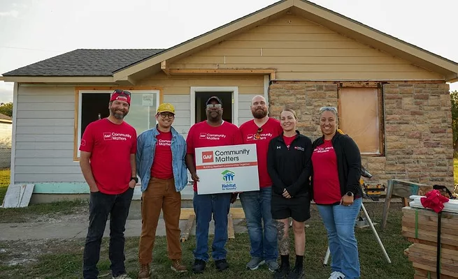 group in front of home 