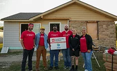 group in front of home 