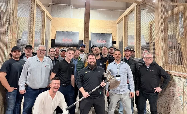 contractors at axe throwing event 
