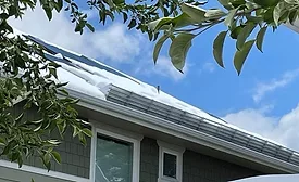 snow retention system installed on roof