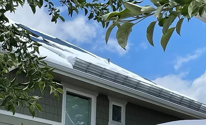 snow retention system installed on roof