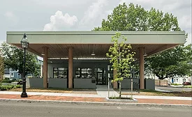 A once-vacant 1950s Getty gas station has transformed into a bustling neighborhood bagel shop.