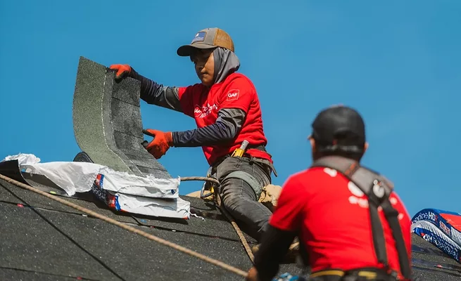 contractors installing shingles