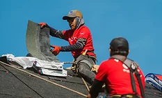 contractors installing shingles