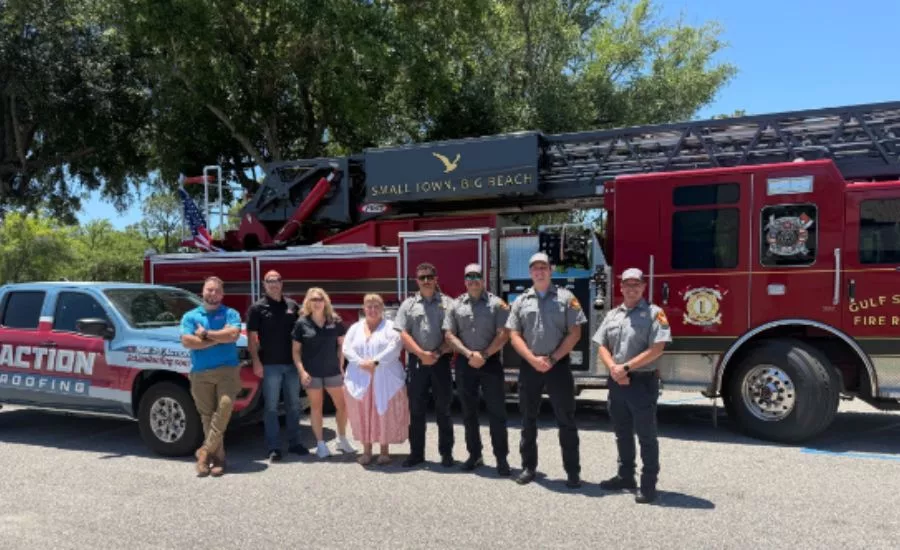 group in front of firetruck 