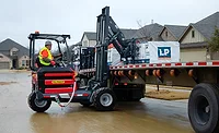 Palfinger forklifts A forklift unloading roofing shingles