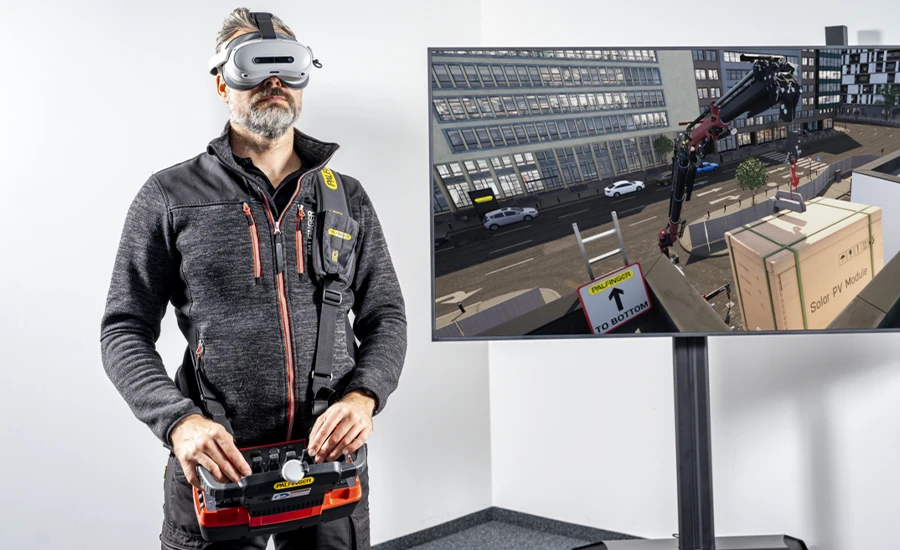 A male operator wearing Virtual Reality Goggles