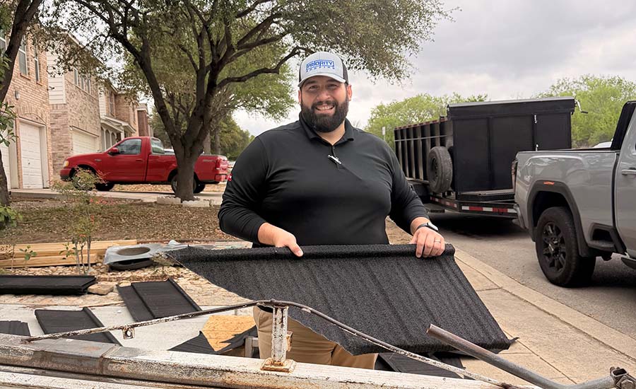 A man on site at a roofing project