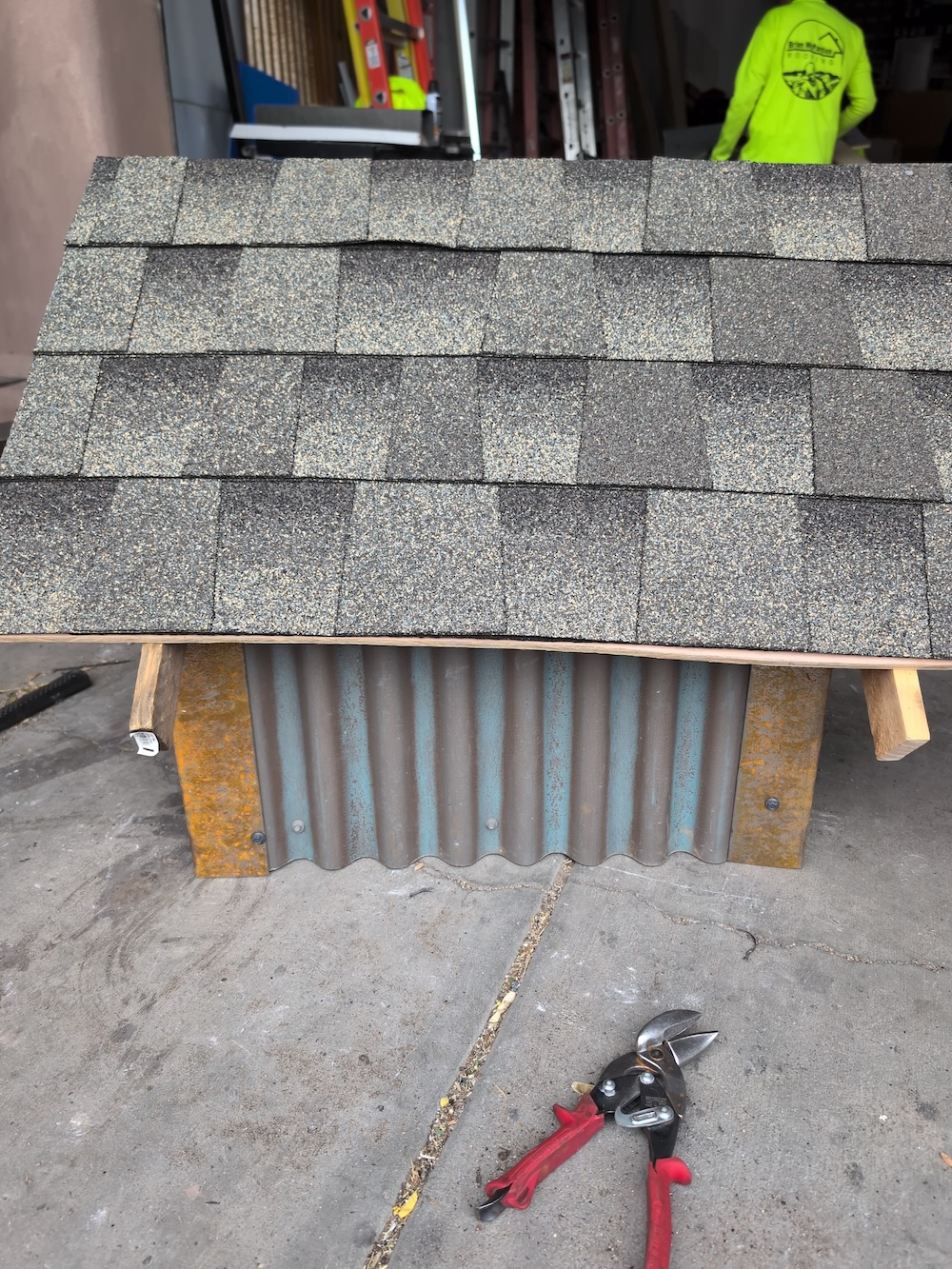 Shingle roof on dog house