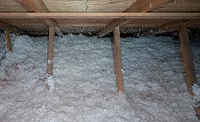 Insulation in an attic.jpg insulation blocking intake vents in an attic