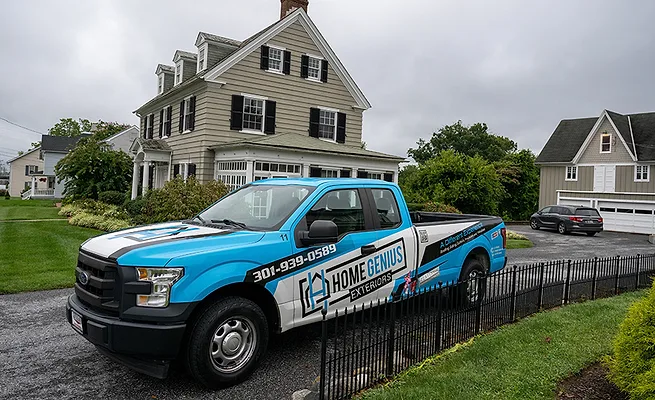 Home Genius Exteriors A truck from Home Genius Exteriors