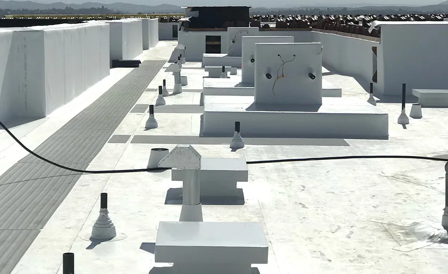 FlashCo-Main-Img-D7-Roofing-Services A finished comercial roof with a white coating