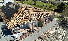 Storm Damage A building that has sustained a lot of storm damage