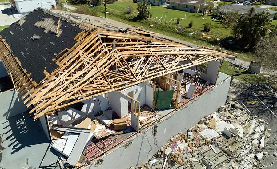 A building that has sustained a lot of storm damage