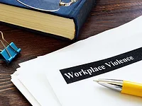 GettyImages-1274989340-1170.jpg workforce violence paperwork on desk