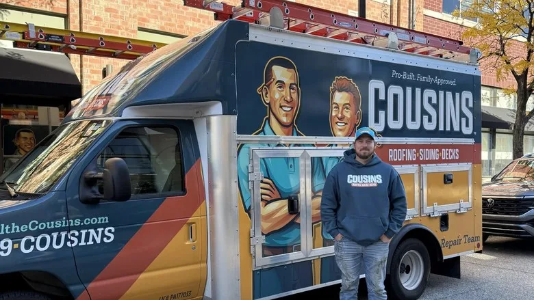 team member by truck