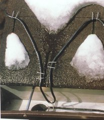 Emerson roof and gutter de-icing system