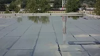 Ponding Water on Building Roof Ponding Water on Building Roof
